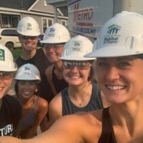 People with Habitat for Humanity hats