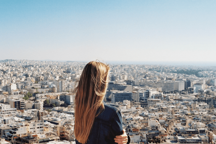 Woman Looking at City