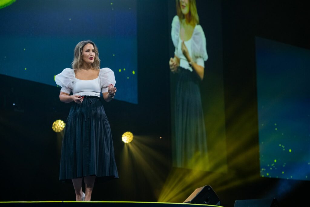 Jessica Calzaretta on stage at Insight Global "Without Limits" Conference