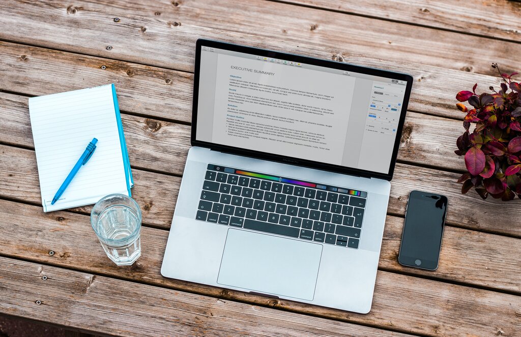 Laptop on table, resume on screen