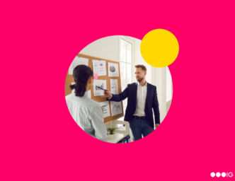 A project manager, a good career for an ENFJ, point to a project on a board