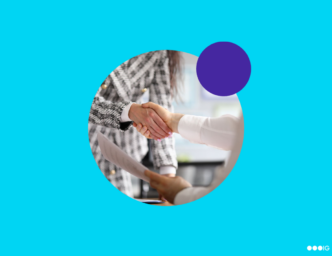 Image of two people shaking hands after extending a job offer.