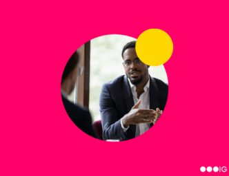Magenta background. Yellow accent circle. Insight Global logo. Circle crop of a black businessman in focus, negotiating with a white business man out-of-focus.