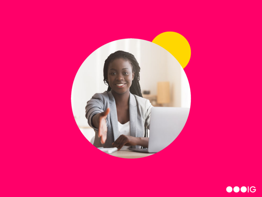 Pink background with black woman reaching out with a handshake for 8 Tips to Make Sure Candidates Accept Your Job Offer