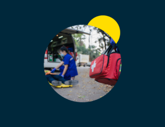 Image of emergency service personnel at a scene with gear Hiring an Emergency Management Specialist
