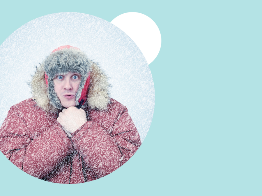 Man in snow parka surrounded by snow against a pale ice blue background What is a Hiring Freeze, and How to Respond to One as a Hiring Manager