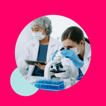 Lab technicians looking at samples under microscope on pink background.